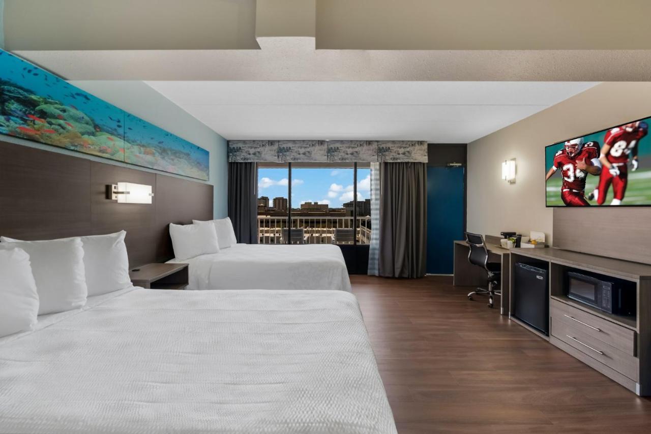 Premium Two Double Beds Partial Ocean View Smoke Upgraded Bedding